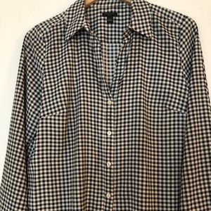 Black and white checker blouse.